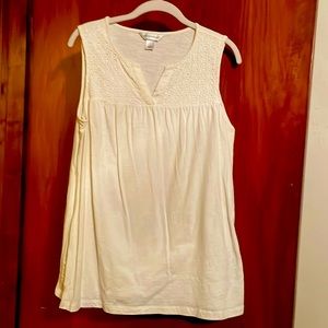 White top with eyelet trim on bodice